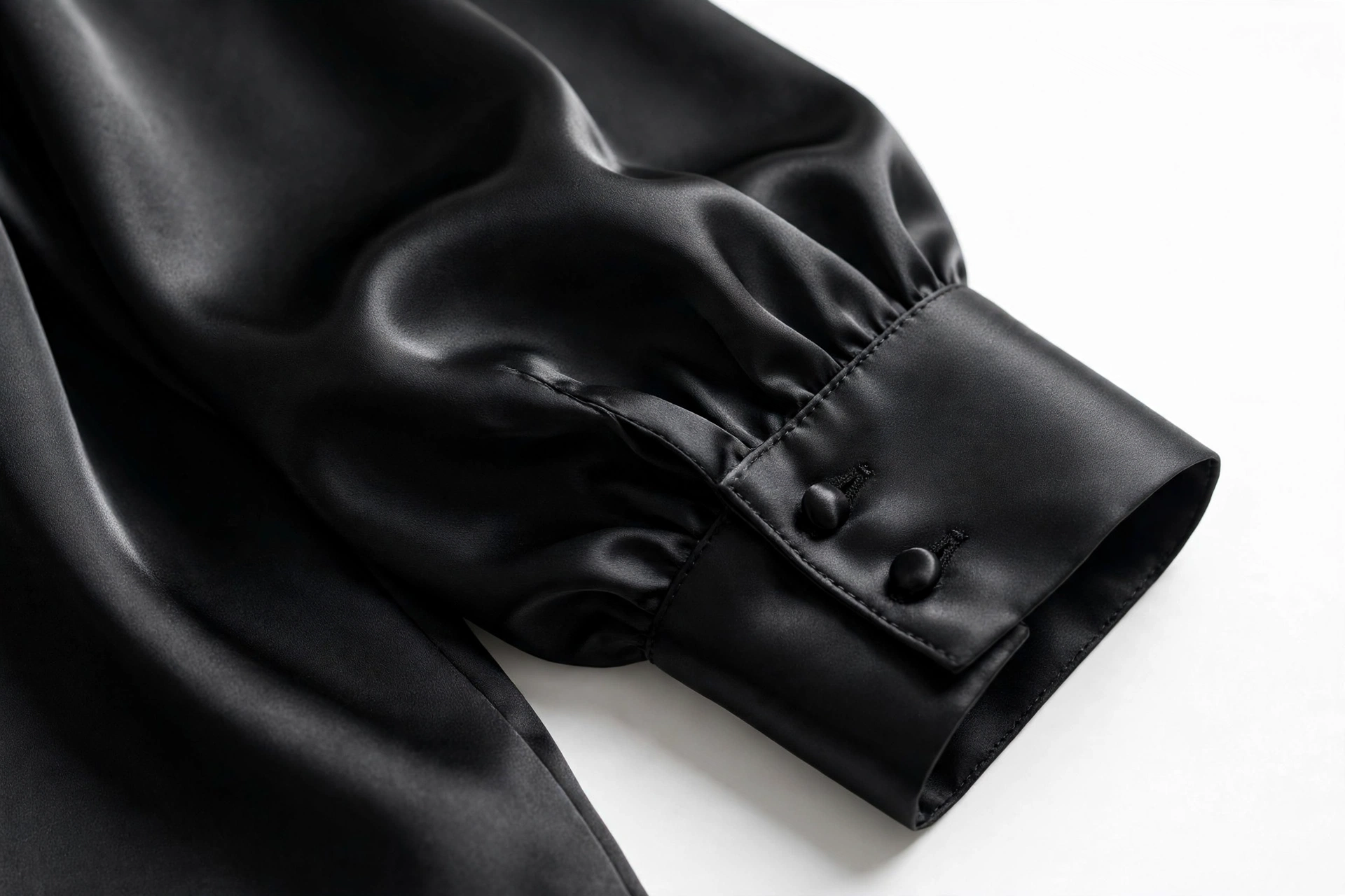 Black satin blouse cuff detail