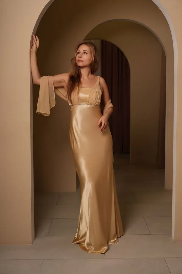 Champagne duchess satin dress in natural daylight