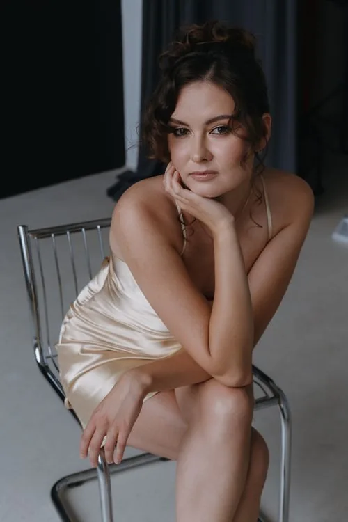 Champagne satin slip dress with soft golden gloss