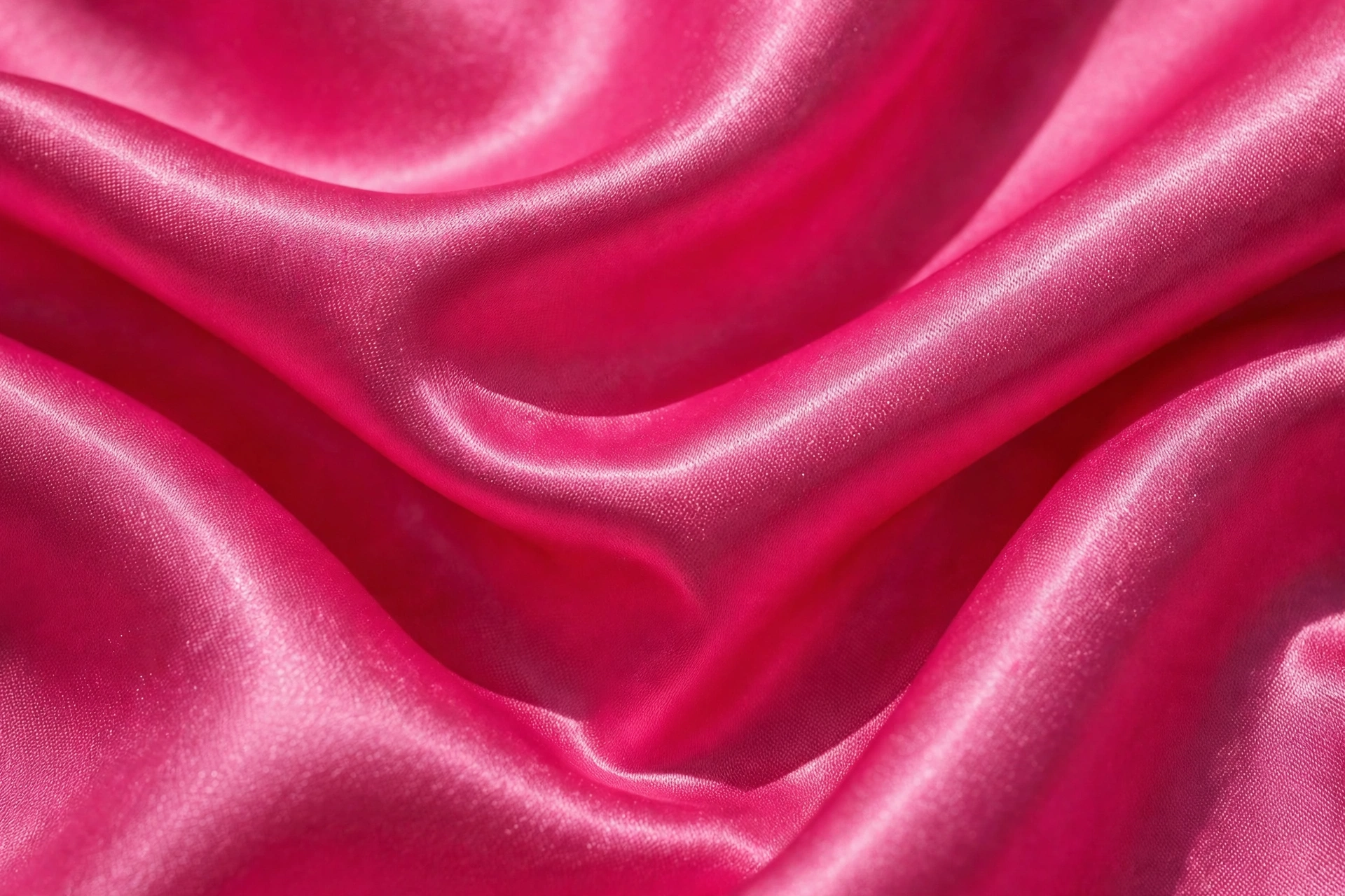 Hot pink satin weave close-up with glossy shine