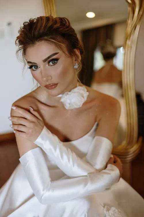 Ivory satin bridal bodice with long satin gloves
