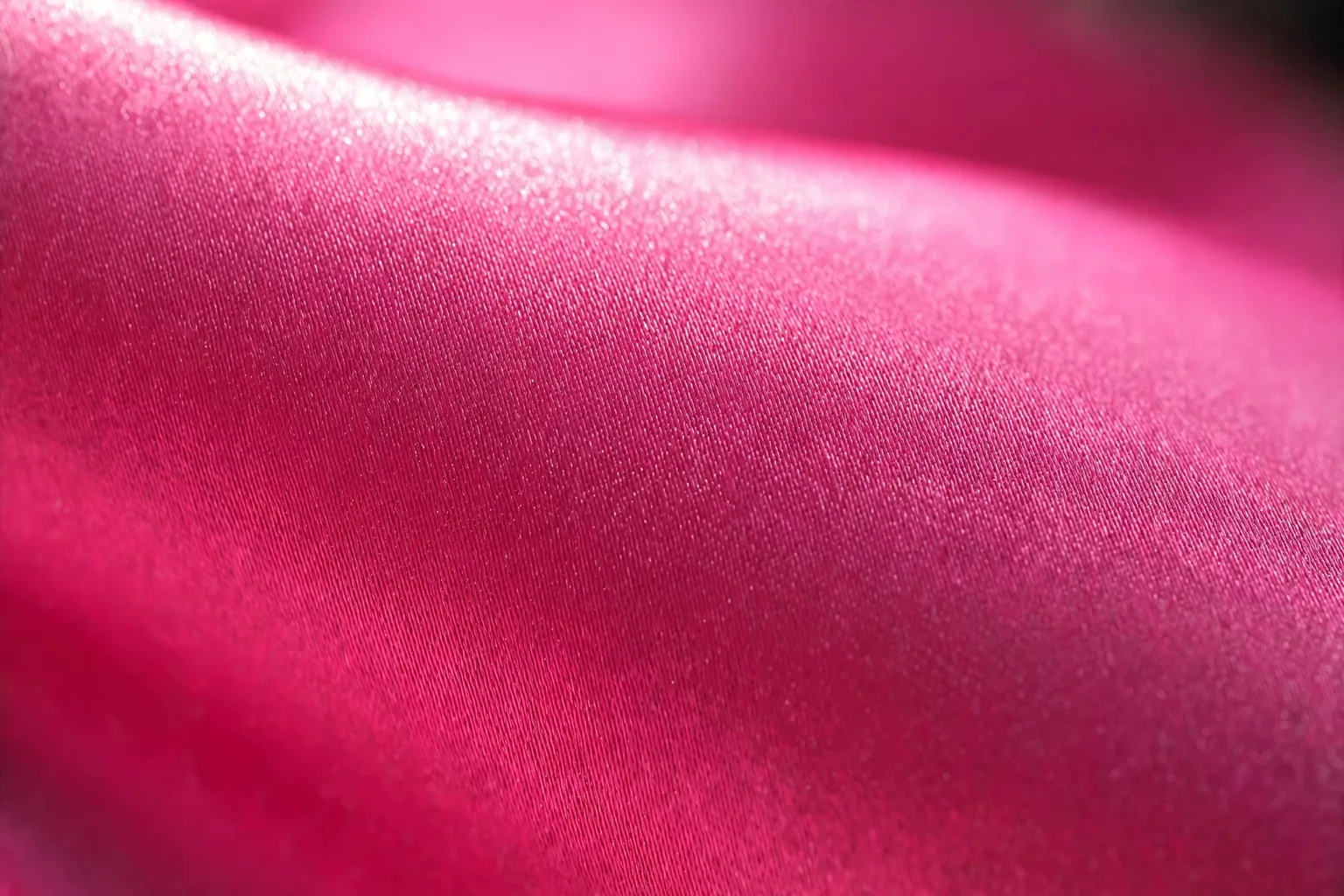 Close-up of polyester satin showing its uniform glossy filament sheen