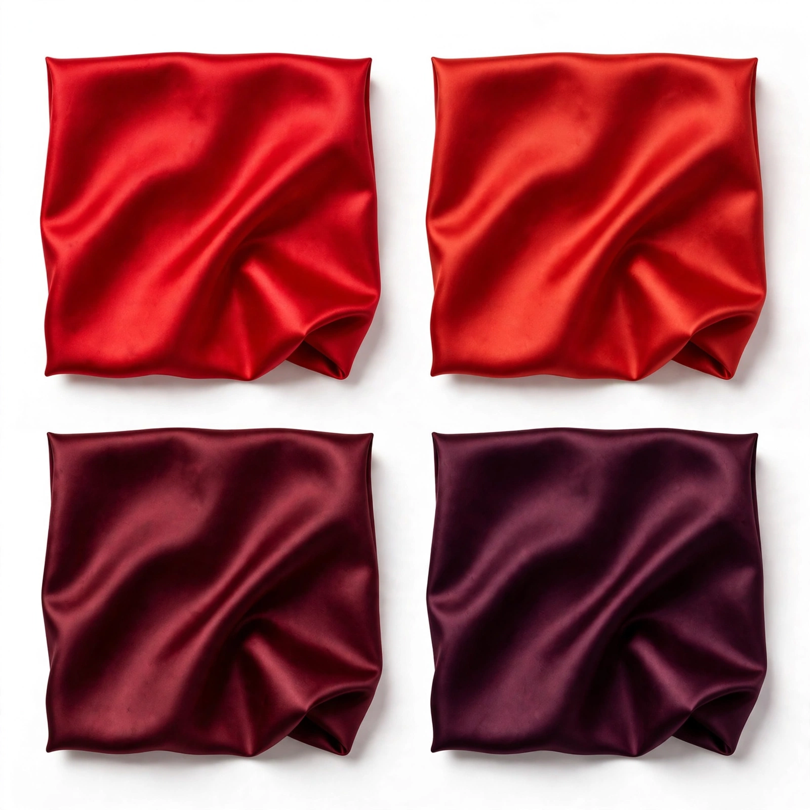 Four red satin swatches in true red, scarlet, burgundy, and wine